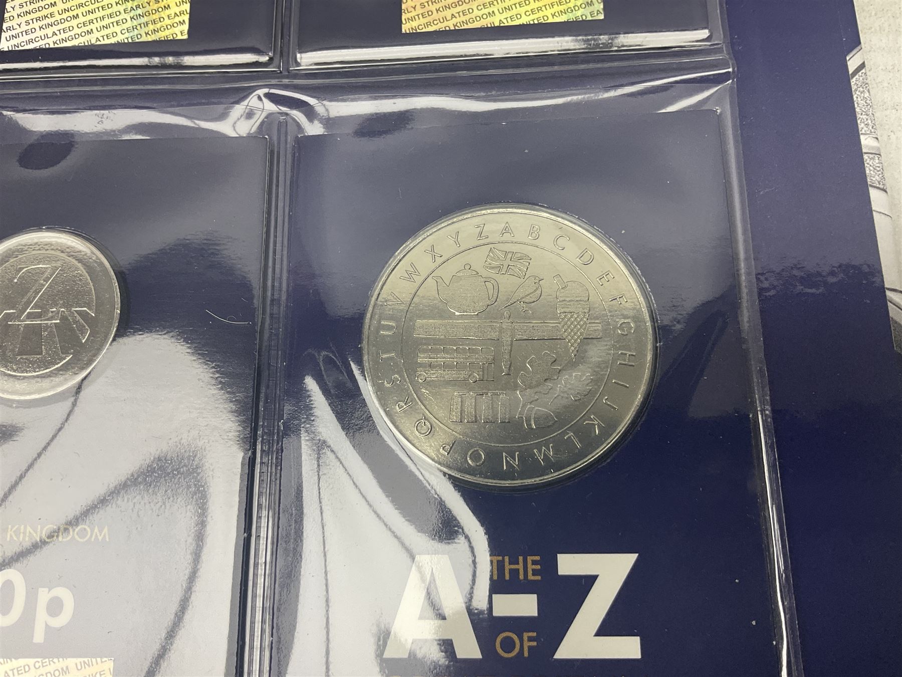 Queen Elizabeth II United Kingdom 2018 A-Z ten pence coin collection, including completer medallion, housed in a 'Change Checker' ring binder folder

