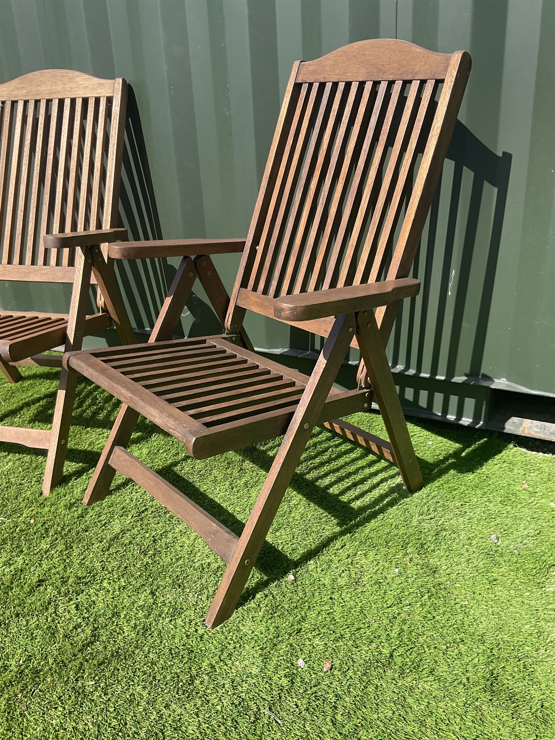 Pair of hardwood folding garden chairs THIS LOT IS TO BE COLLECTED BY