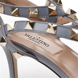 Valentino Garavani - pair of Rockstud grained leather and leather strap stiletto heels in blue, with pointed toes and gold tone pyramid stud detailing to the uppers, size 38, unused with original box and dust bag