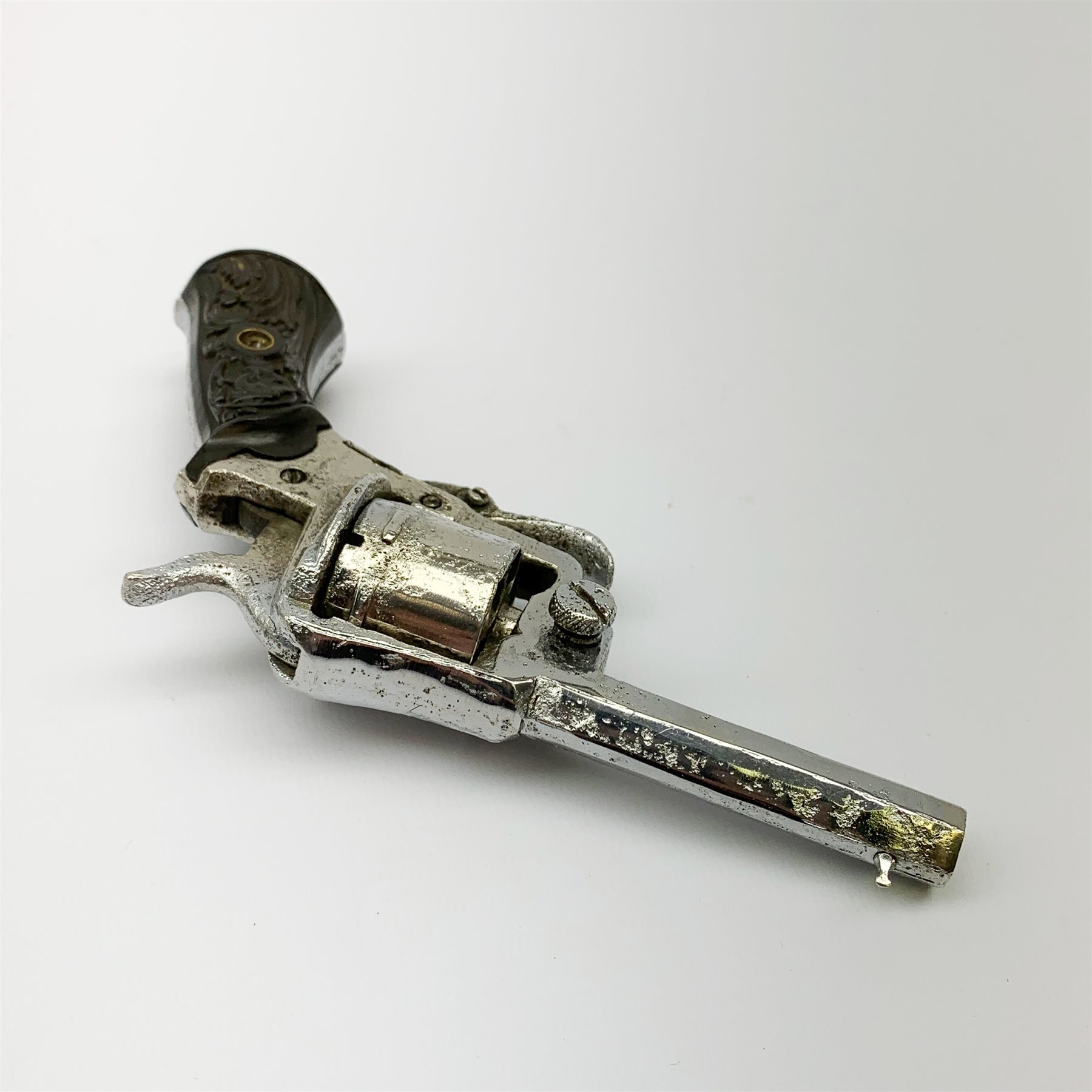 19th century plated Belgian 7mm pin-fire revolver, the six-shot cylinder inscribed 'The Young Lion 1881 New Pattern', with folding trigger and carved walnut split stock, barrel length 7.5cm, overall length 18.5cm