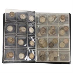 Approximately thirty-two Great British pre-1920 and approximately forty Great British pre-1947 silver threepence coins, in black folder