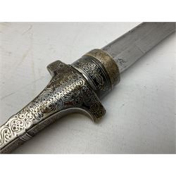 Moroccan jambiya dagger, the 22cm curving steel blade with ornate brass and white metal hilt, and matching ornate brass and white metal scabbard with two suspension rings L41cm overall