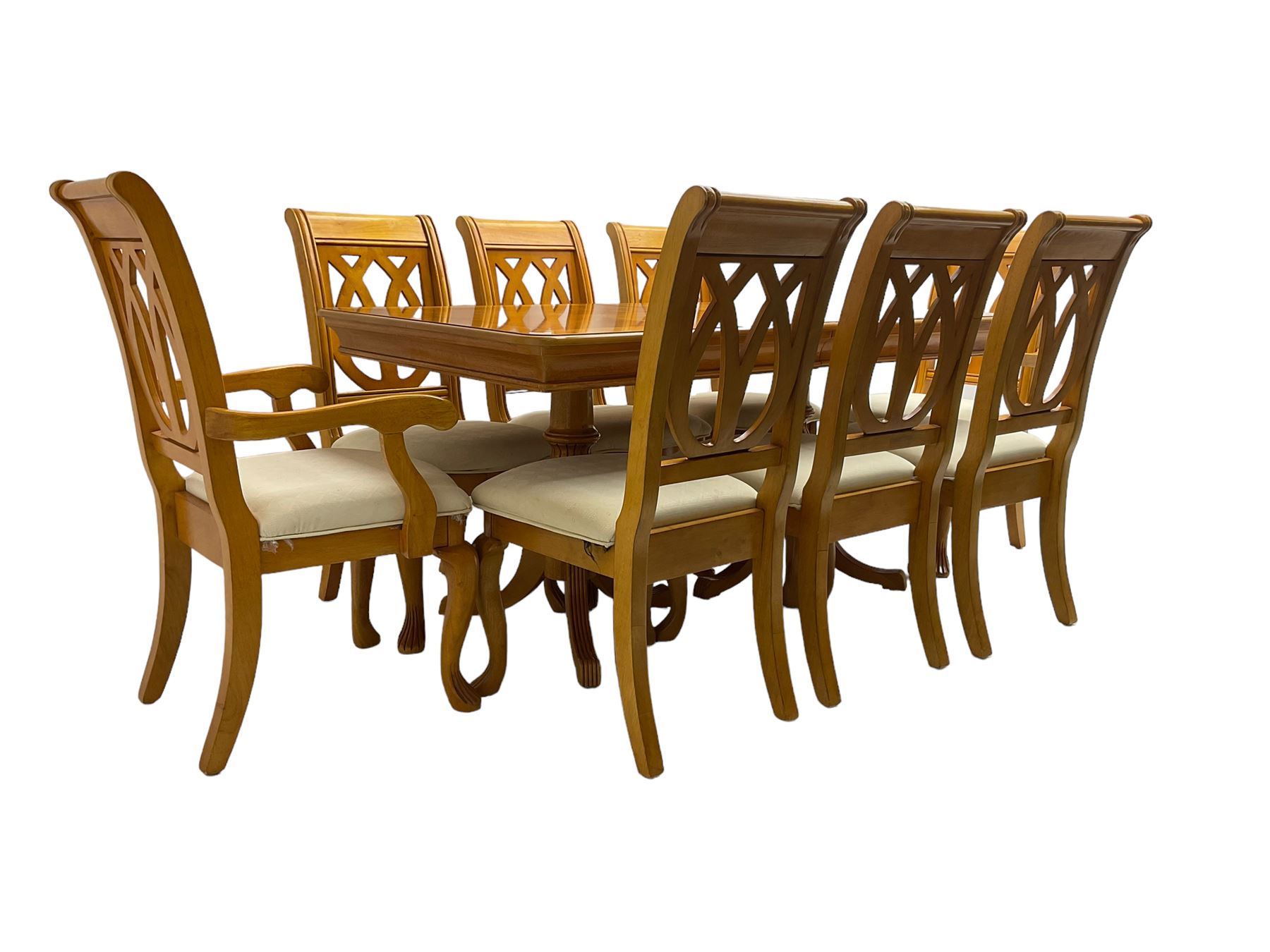 Yew wood extending twin pedestal dining table, rectangular top with ebony stringing over turned and reeded vasiform pedestals on tripod bases, with two additional leaves (W159cm D92cm); and set of eight (6+2) matching dining chairs, high pierced backs over seats upholstered in ivory fabric, on cabriole supports (W57cm H101cm)