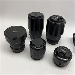 Two Canon camera bodies 'Canon EOS 350D Digital' and 'Canon EOS 1000', five camera lenses including Sigma, Yongnuo and Canon and various other camera accessories 