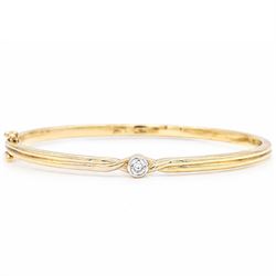 9ct gold diamond hinged bangle, set with a single round brilliant cit diamond, hallmarked