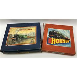 Hornby '0' gauge - Passenger Set No.21 with clockwork No.20 type 0-4-0 tender locomotive No.60985, two coaches and track, boxed; and Tank Passenger Set No.101 for spares or repair with clockwork No.101 type 0-4-0 tank locomotive No.2270, three coaches and track, boxed (2)