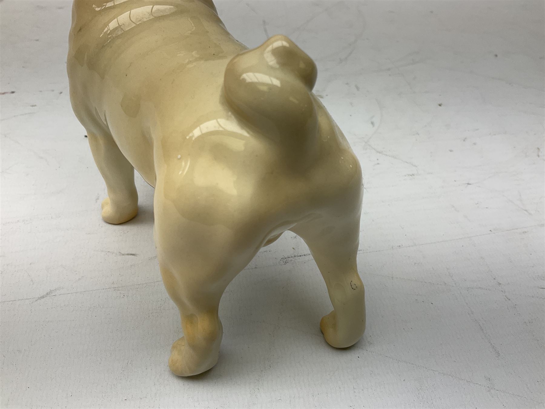 Three Beswick models comprising Hereford Bull no 949, 'CH Cutmil Cupie' Pug, and bay Shire horse, all with printed marks beneath