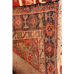  Karajeh black and red ground runner, repeating border, 330cm x 80cm  