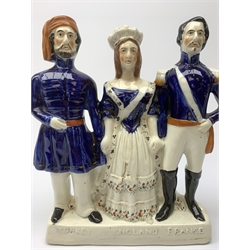 A 19th century Staffordshire pottery figure, modelled as Wellington, H19cm, together with a Staffordshire pottery figure group, Turkey, England, France, H28cm. 