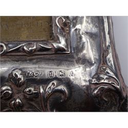 Art Nouveau silver mounted photograph frame, of rectangular form, embossed with flowers and foliage, with easel style support verso, hallmarked Birmingham 1918, maker's mark B & Co, H28.5cm