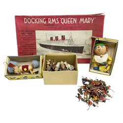 Vintage toys comprising 'Docking RMS Queen Mary' game, two boxed Pelham puppets, quantity of painted metal British soldiers to include Guardsmen, painted farm animal figures