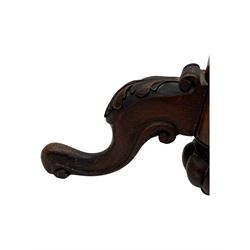 Late 19th century mahogany torchère stand, with circular top above a twisted and foliate carved collumn, on a scroll carved tripod base, on cabriole legs