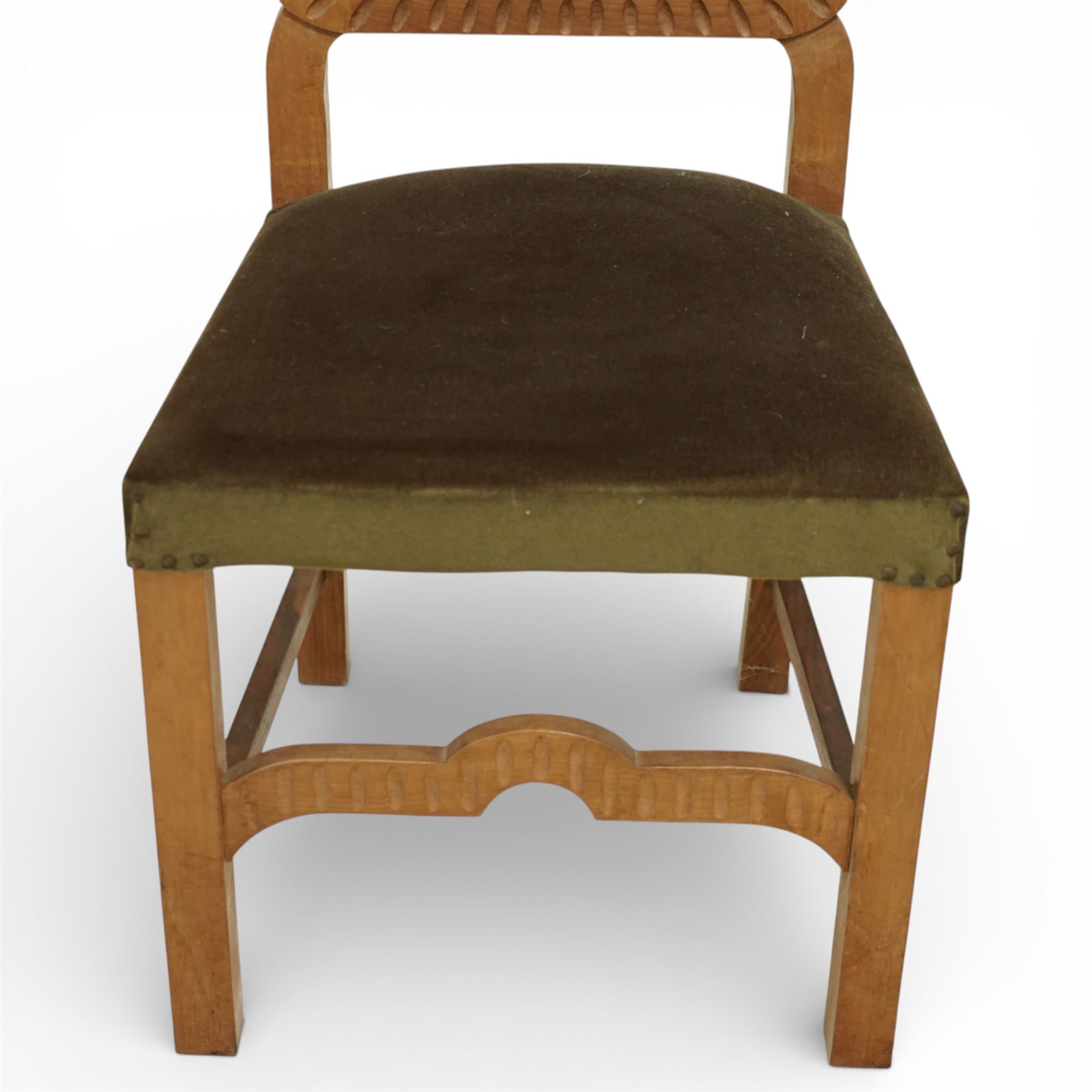 20th century set of eight dining chairs, high back form with shaped and scalloped back rails enclosing upholstered panels, matching upholstered seats, on square legs with shaped apron stretchers