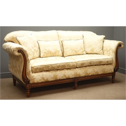  'Medallion Mendelssohn' three seat settee, upholstered in gold raised floral pattern fabric, scrolled arms with acanthus carvings, short fluted feet, W207cm  