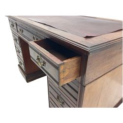 Edwardian mahogany twin pedestal desk, fitted with nine drawers