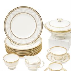 Wedgwood 'Colonnade' pattern dinner and tea service comprising twelve dinner plates, twelve dessert plates, nine soup bowls and stands, pair of covered vegetable dishes, sauce boat and stand, eight tea cups and saucers, thirteen tea plates, milk jug and sugar bowl