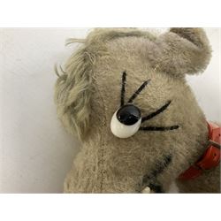 Mid-20th century large plush covered woodwool filled teddy bear with revolving head, applied eyes, stitched nose and mouth and jointed limbs H67cm; three other mid-20th century teddy bears including one by Pedigree; and soft toy donkey with applied glass eyes and open mouth (5)
