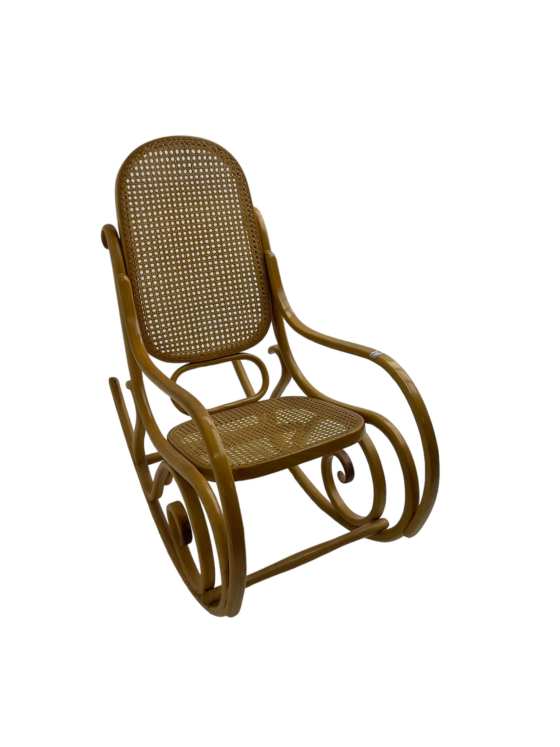 Early to mid-20th century Michael Thonet design bentwood rocking chair, with cane seat and back