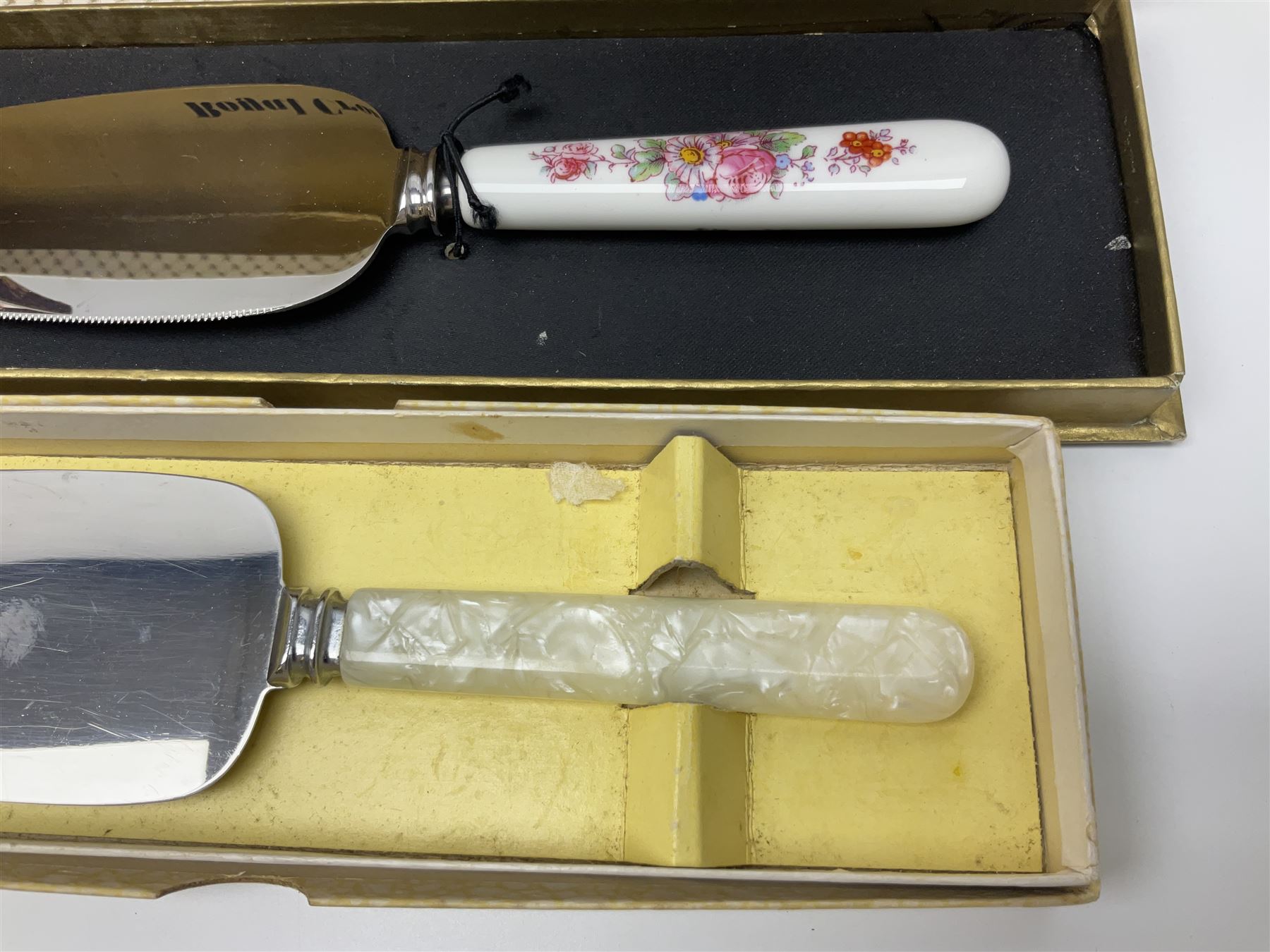 Collection of silver-plated cutlery including cased set of six EPNS cake forks, Royal Crown Derby pie server, sugar tongs, ladles, etc