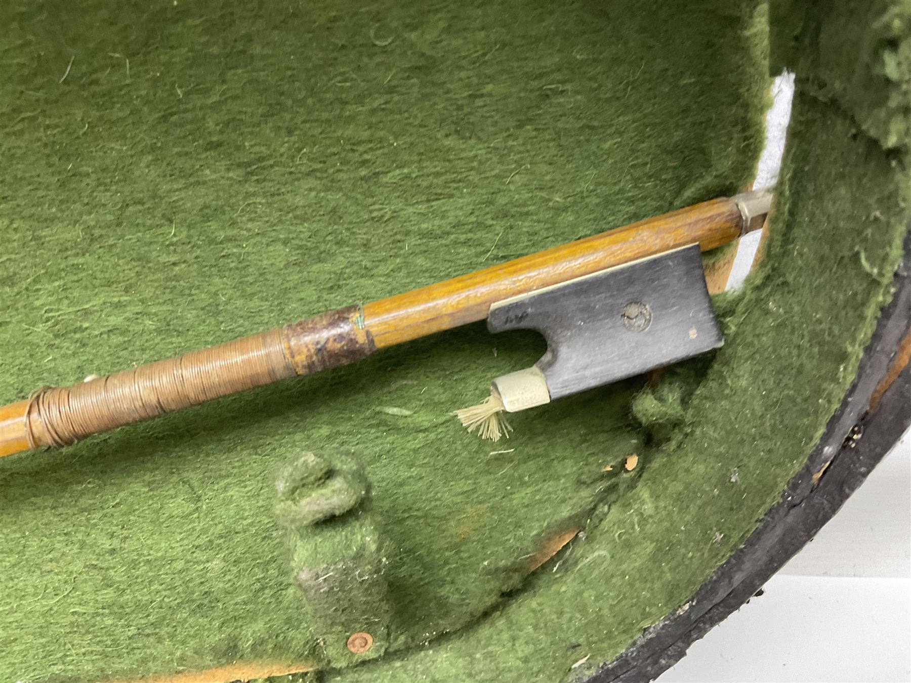 Czechoslovakian violin c1920 with 36cm two-piece maple back and ribs and spruce top, bears label 'Copy of Antonius Stradivarius Made in Czechoslovakia' L59cm; in carrying case; 1950s Czechoslovakian violin; and 195os Czechoslovakian three-quarter size violin; both cased (3)