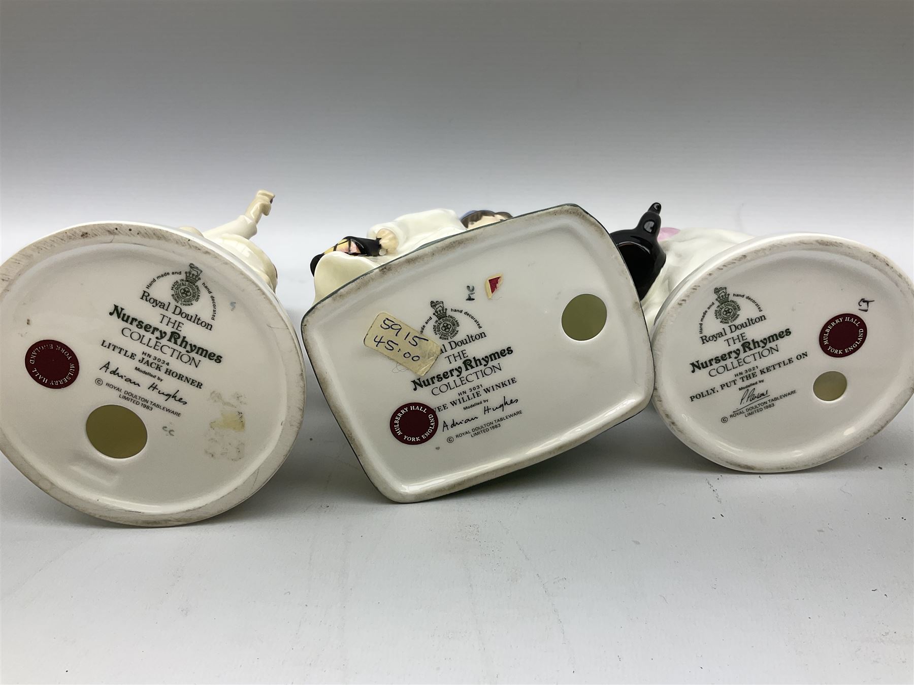 Seven Royal Doulton figures from the Nursery Rhymes Collection comprising, Tom Tom, the piper's son HN3032, Little Jack Horner HN3034, Wee Willie Winkie HN3031, Polly, put the kettle on HN3021, Little Bo-peep HN3030, Little Boy Blue HN3035, Little Miss Muffet HN2727, together with two Royal Doulton Mary had a little lamb figures HN2048 and COPR1948, all with printed marks beneath  