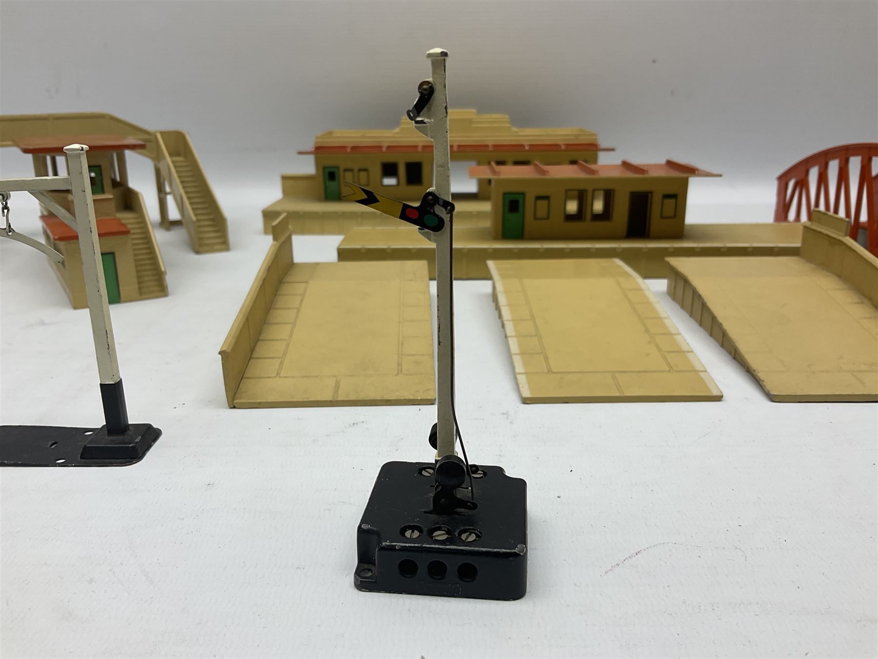 Hornby Dublo - two stations, signal box, 3-piece platform, footbridge, girder bridge etc; and other die-cast trackside and station accessories; all unboxed