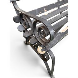 Coalbrookdale - rare pair of wrought iron and slatted wood garden benches, the twin wrought iron strapwork bench-ends formed of four scrolls over splayed feet, number 77 in the Coalbrookdale Castings Catalogue (see illustration)