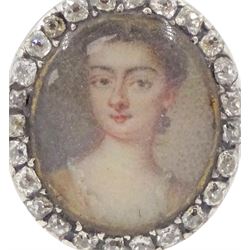 18th/ 19th century gold diamond portrait ring, set with an oval miniature of a woman on ivory, under a glazed panel, with old cut diamond surround and rope twist shank. This lot has been registered for sale under Section 10 of the APHA Ivory Act