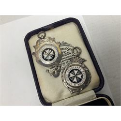 Four St John's silver fobs, together with two silver Directors Ambulance shield fobs and two other St Johns items 