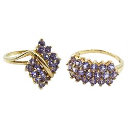 Gold tanzanite marquise shaped cross over ring and a gold three row tanzanite ring, both hallmarked 9ct 