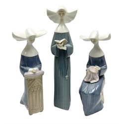 Three Lladro figures of nuns, comprising Prayerful Moment, no 5500, Time To Sew, no 5501 and Mediation, no 5502, tallest example H27cm