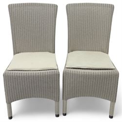Neptune – Sheldrake limed oak extendable dining table and eight Havan loom chairs, the oval top in limed oak finish with four additional leaves extending the table to seat up to ten (Extends to cm), raised on turned legs with two additional centre supports, the matching Havan loom chairs finished in grey with cream upholstered seat covers (H 95cm, W 47cm, D 55cm)