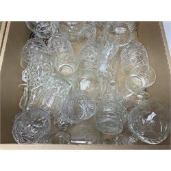 Quantity of crystal and glass ware, to include drinking glasses, Waterford crystal mantel clock, decanter, etc, in two boxes 