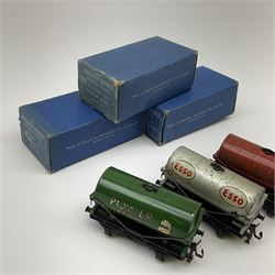 Hornby Dublo - Petrol Tank Wagon D1 'Power Ethyl'; Oil Tank Wagon D1 'Royal Daylight'; and Petrol Tank Wagon D1 'Esso'; all in medium blue boxes (3)