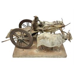 19th Century Indian, possibly Krishnanagar figure group, modelled as oxen and cart on rectangular base, H24cm