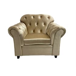Chesterfield shaped armchair, upholstered in buttoned champagne fabric, with scatter cushions