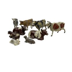 Britains Nestles 'The World's Cow' decorated with map-of-the-world pattern L8cm; and eight other various sized lead figures of cows, standing or reclining, by Britains, Hill & Co etc (9)