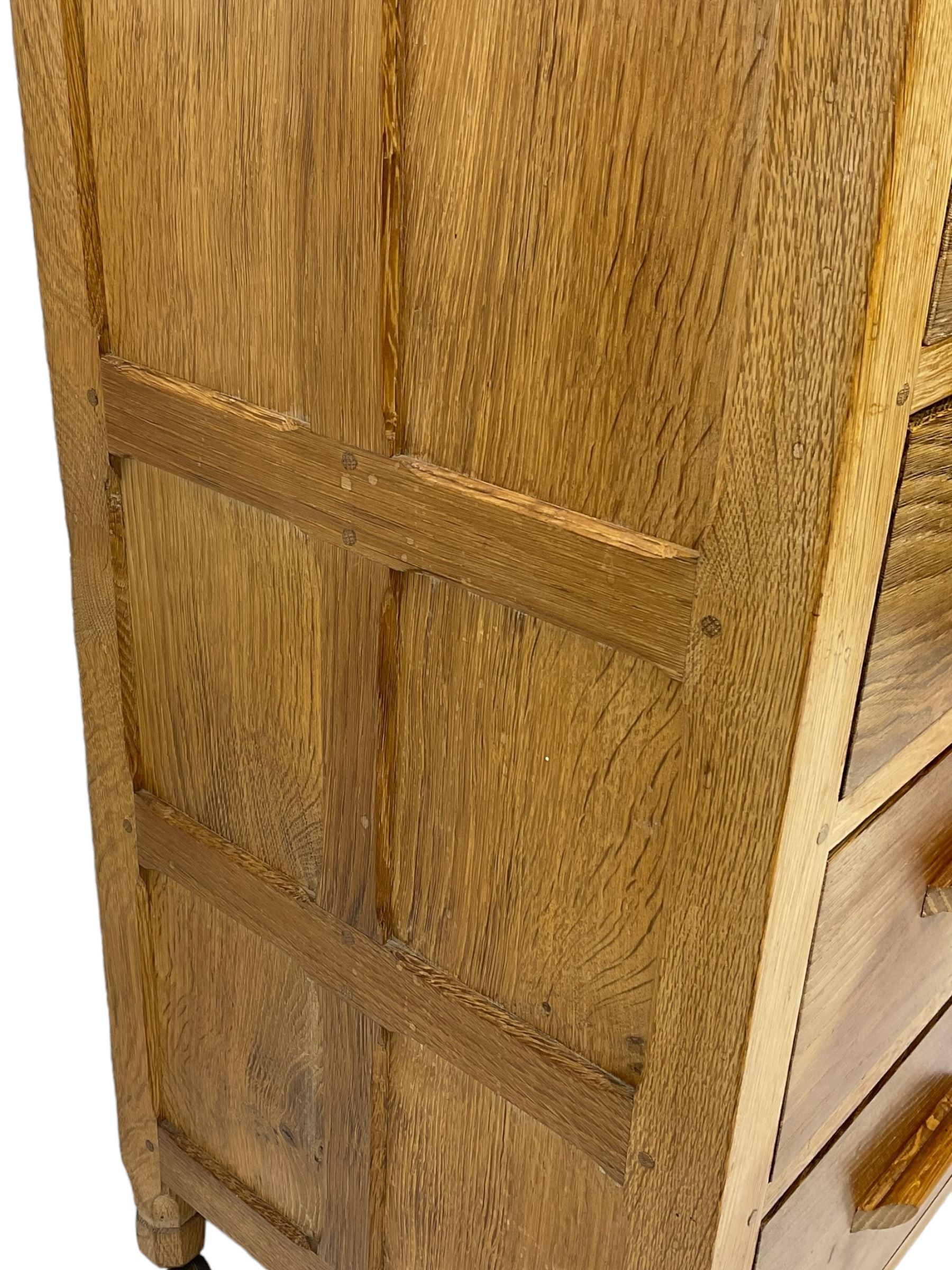Yorkshire Oak - oak chest, fitted with two short over three long drawers, on octagonal feet with castors 