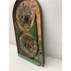 1934 Lindstrom's 'Airways' tin-plate bagatelle game by Lindstrom Tool and Toy Company Bridgeport Conn., the decorative bagatelle board depicting Lindstrom's epic airway routes; with wooden peg and quantity of balls H61cm