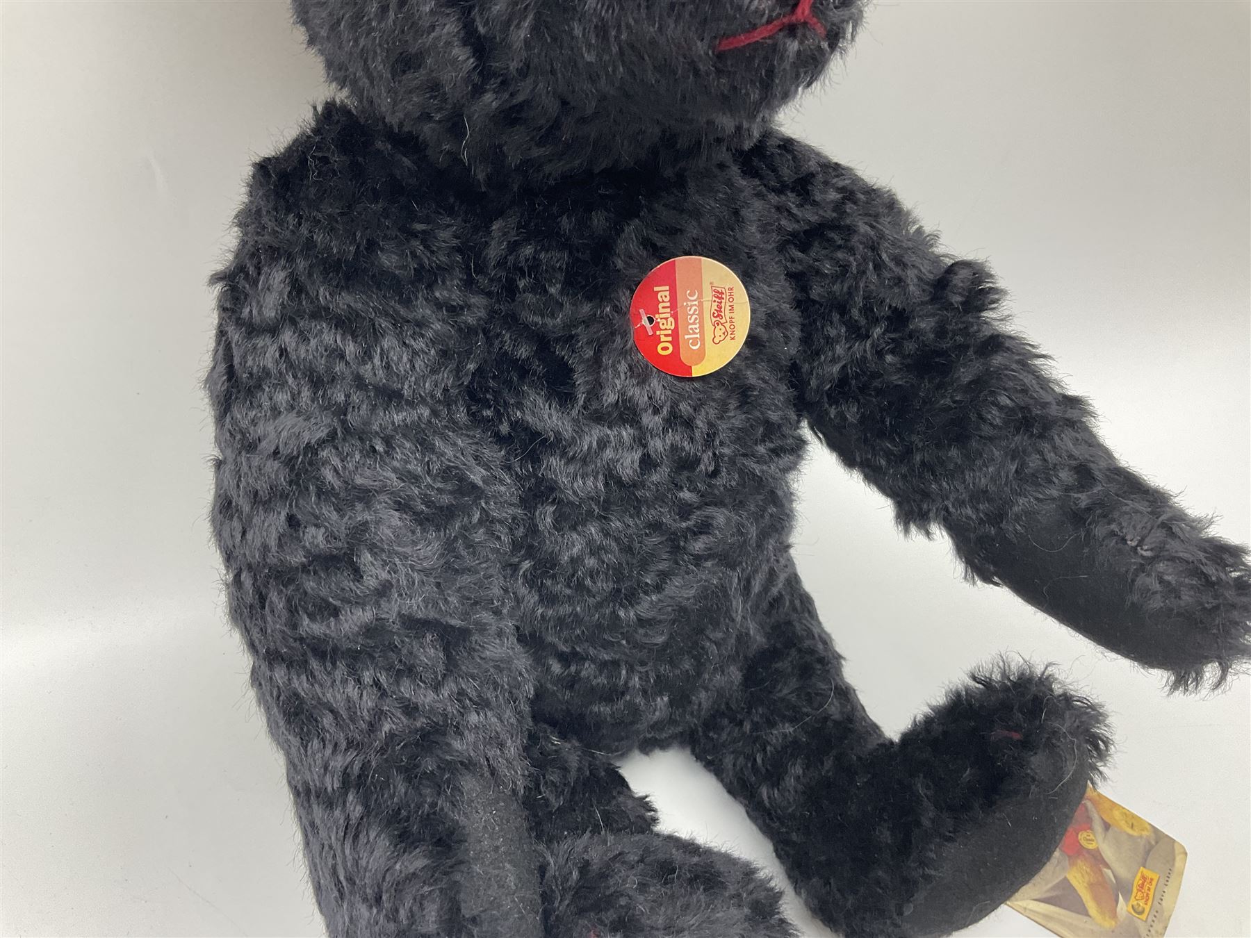 Steiff Classic Teddy Bear in black mohair with working growler mechanism and red stitched detail, H42cm