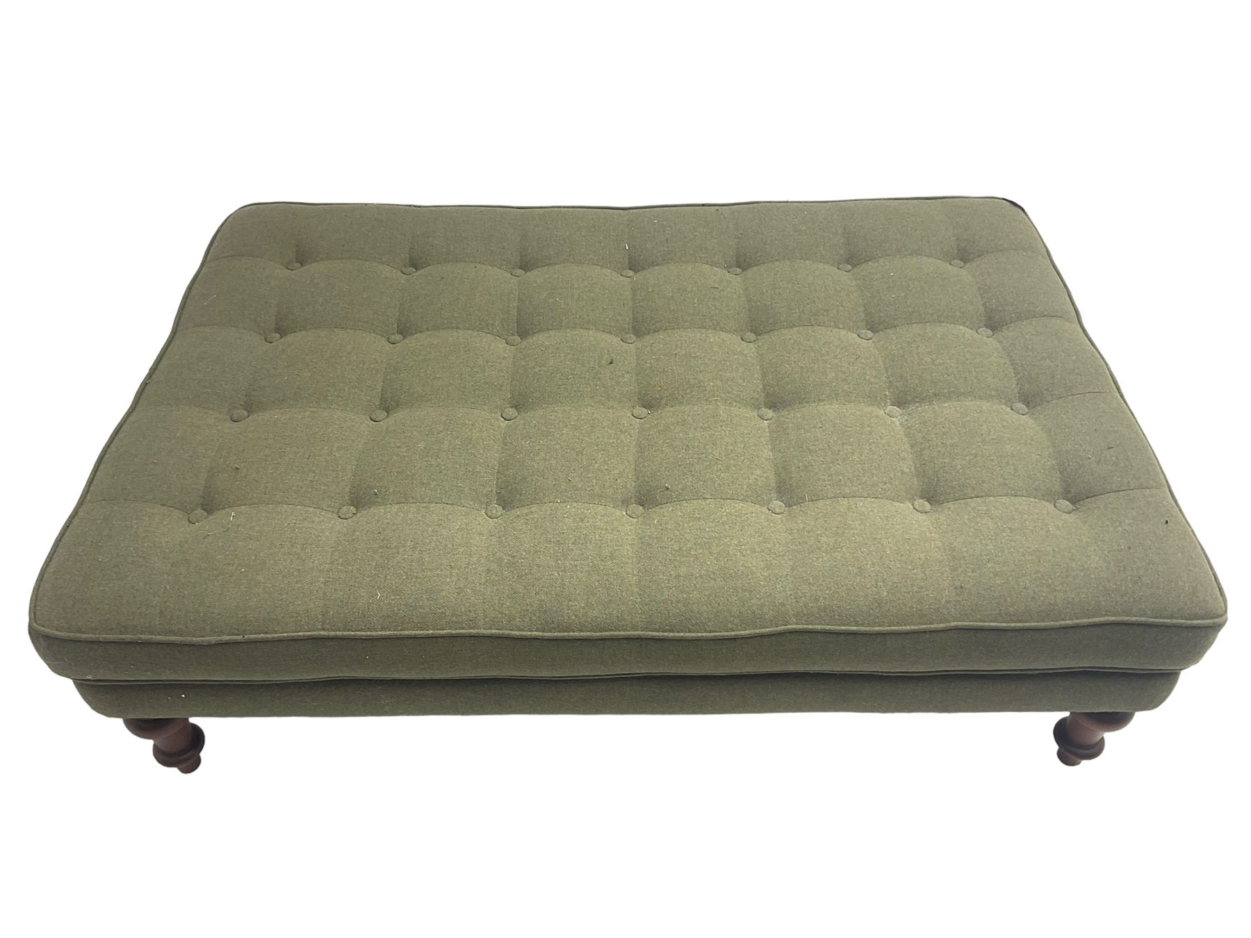 Peter Silk of Helmsley - large rectangular footstool upholstered in buttoned green tweed fabric, on turned mahogany feet