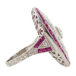Platinum diamond and ruby oval cluster ring, principal transitional cut diamond of approx 0.55 carat, with milgrain set openwork diamond surround and calibre cut ruby border, with ruby and diamond shoulders