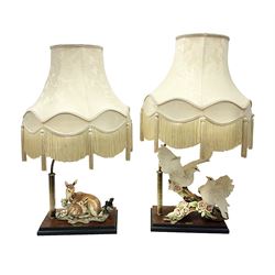 Two Giuseppe Armani figural lamps, the first 'Bonding' modelled as a deer and a fawn, the second modelled as a pair of white doves, each with damask fabric tassel shades, tallest H76cm