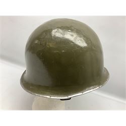 1950s French Algerian War steel helmet with liner; indistinctly marked 'S.I.A. LE EANS(?) 71R'
