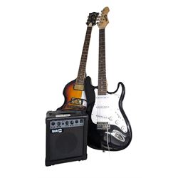Rock Jam six string electric guitar, together with a Rock Jam amplifier and an Atrics guitar