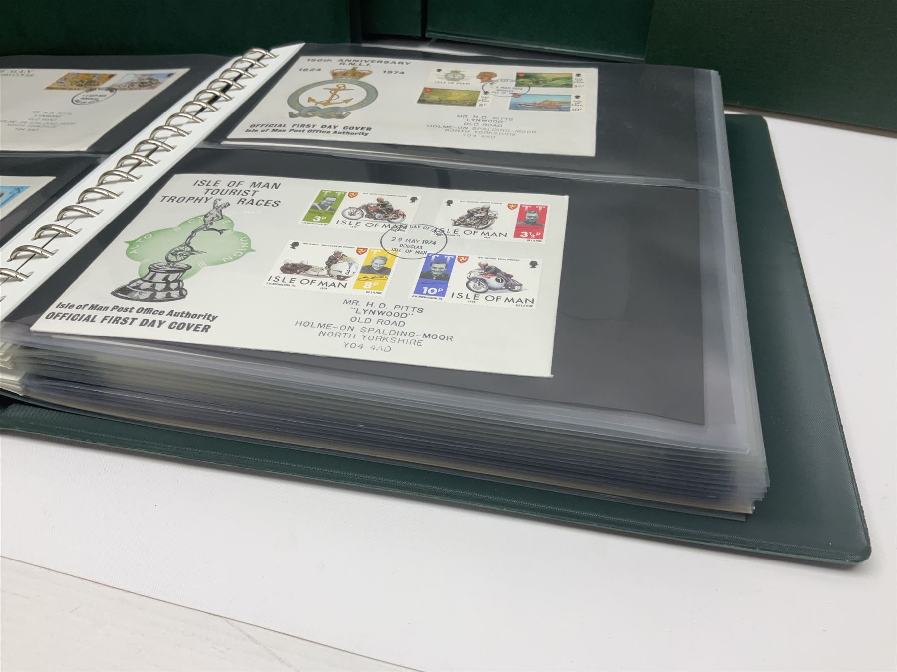 Mostly Queen Elizabeth II Great Britain and Isle of Man stamps including mint examples, housed in various albums, stockbooks and loose, in one box