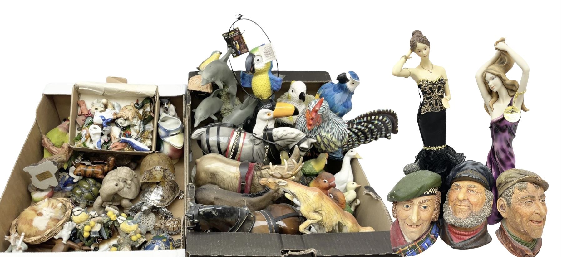 Three Legend Products plaster head wall plaques, comprising The Tinker, Jock and The Bosun, together with two The Leonardo Collection figures Sophistication and Desire, tallest H35cm, Quantity of animal figures and figure groups, to include ceramic and composite examples of dolphins, birds, Shire horses etc, in two boxes
