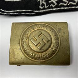 Three Reichsfuhrer 'SS' cuff titles; RZM 'SS' paper tag; German Water Police belt buckle; Destroyers badge marked RKS verso; N.S.B.O. lapel badge; and incomplete party eagle cap badge (8)