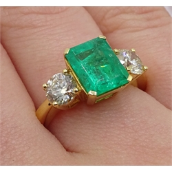 18ct gold emerald and brilliant cut diamond three stone ring, hallmarked, emerald 2.32 carat, total diamond weight 1.11 carat  