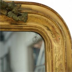 Louis XVI style gilt overmantel mirror, arched rectangular form with moulded frame, surmounted by a pediment carved with ribbon-tied grapevine and leaf decoration, enclosing a plain mirror plate, circa 1900